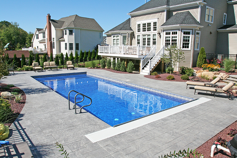 Swimming pool and stamped concrete project example 68